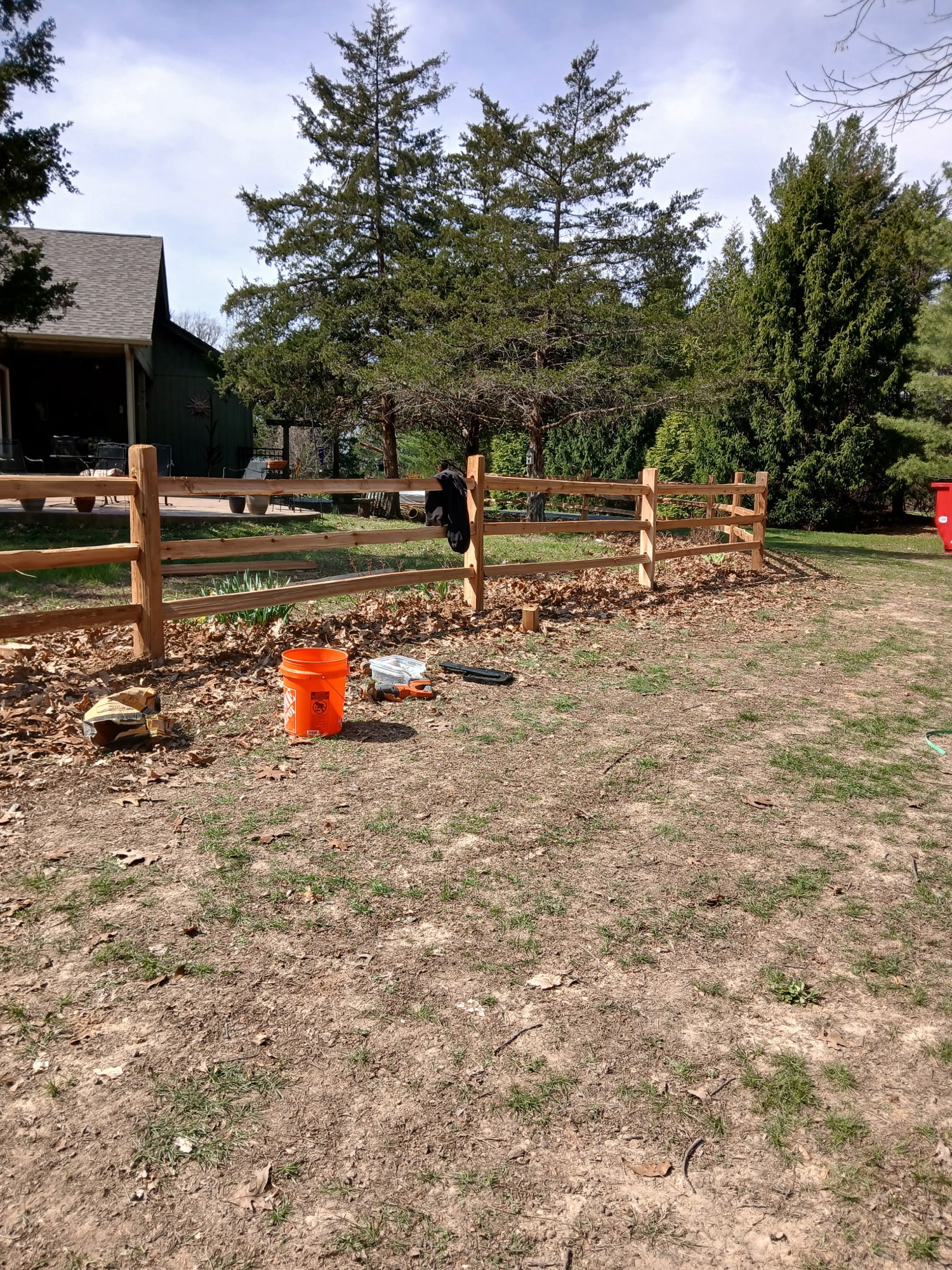 Split rail cedar fence installation on acreage property