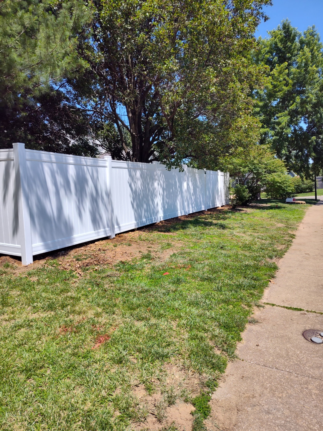 White vinyl privacy fence full perimeter, St. Charles MO